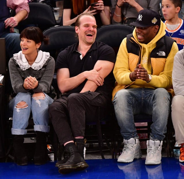 Lily Allen, David Harbour and Michael Che at a New York Knicks v New Orleans Pelicans preseason game 
