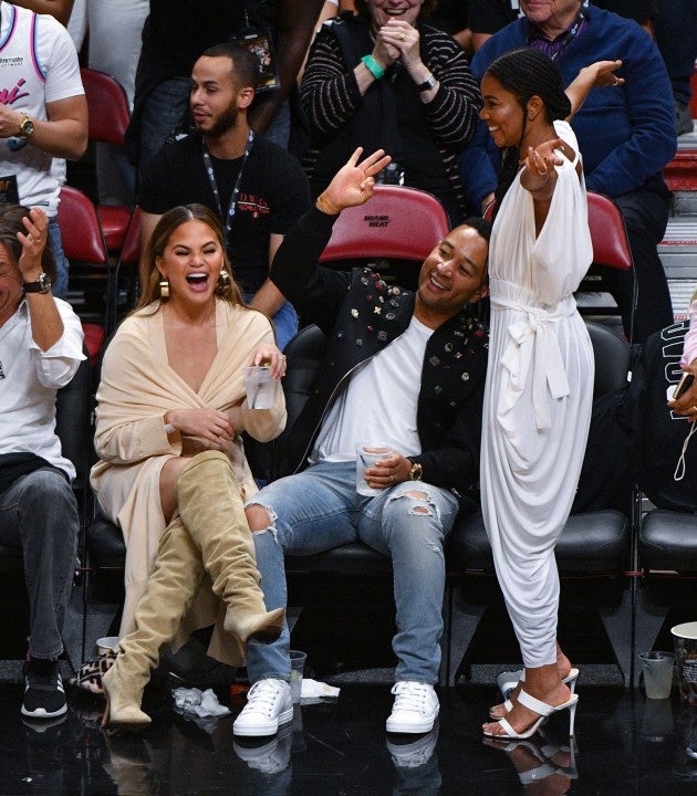 Gabrielle Union, Chrissy Teigen and John Legend at Miami Heat game
